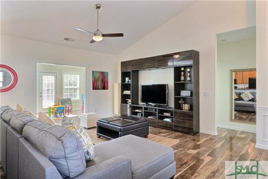 Great room, sunroom with wood floors