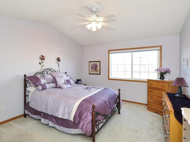 One of two upper level bedrooms