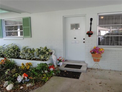 Separate entrance to 3rd bedroom, office, or studio.  Enter from carport - never get wet!