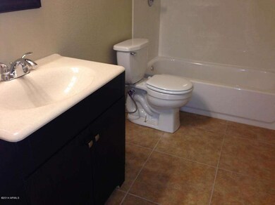 Hall bath - new tile,tub,cabinet, toilet