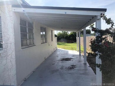 11458 SW 214th St, Miami, FL 33189 - photo 2