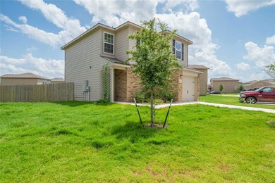 View of front of home featuring concrete driveway