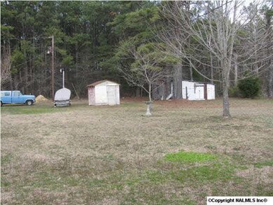 Well house and storage building.