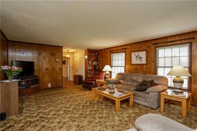 Spacious living room that opens to the dining room area and kitchen