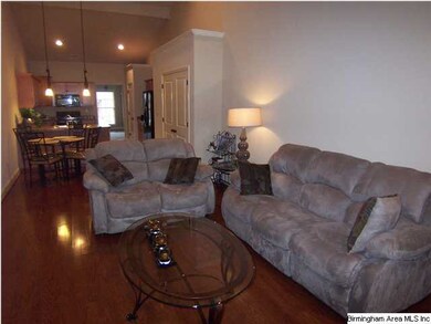 Great room is open to eating area, breakfast bar a
