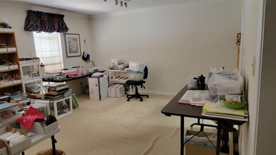 Large living room with crown molding