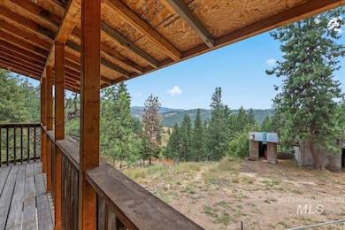 Wooden terrace featuring a mountain view