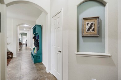 Entry way of the home offers a coat closet.