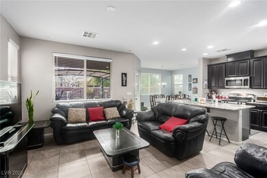 Living area featuring light tile patterned floors,