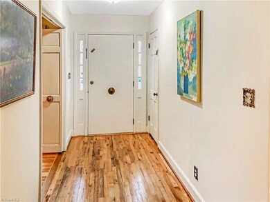 Foyer with new hardwood flooring