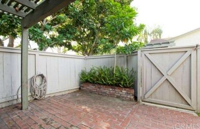 Brick patio and entry gate.