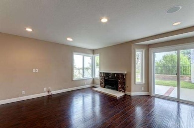Family Room and Fire Place, Mahogany Flooring thro