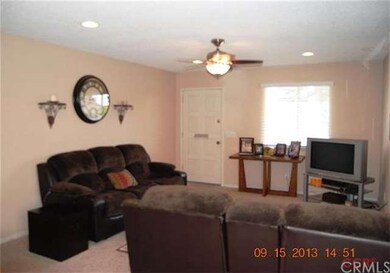 Spacious feel to the living room. Recessed lightin