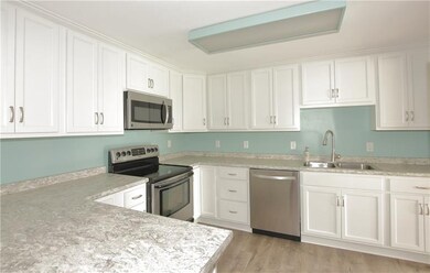 Beautifully updated kitchen in the main part of th