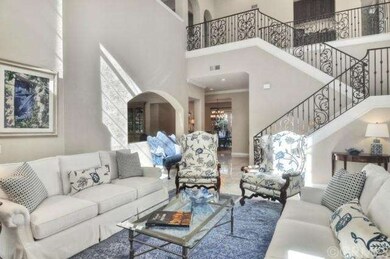 Flowing floor plan into the adjacent family room a