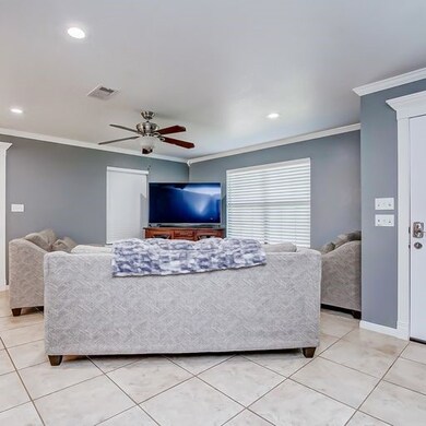 View of the living room and the front door.