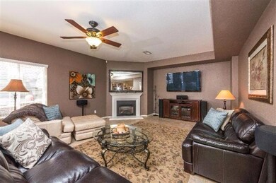 Family room with Lennox fireplace insert with blow