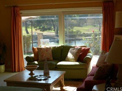 View of backyard and pond.