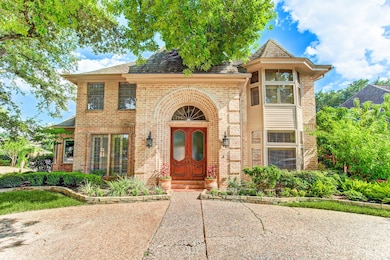 Large corner lot with round driveway and newly des