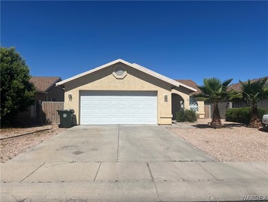 Ranch-style home with a garage