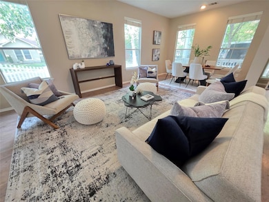 Living room featuring wood finished floors and re