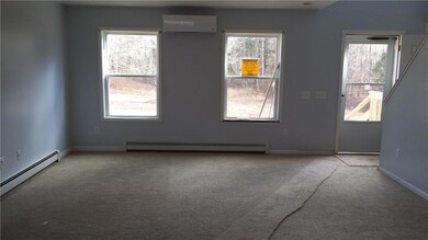 Living room open to the kitchen.