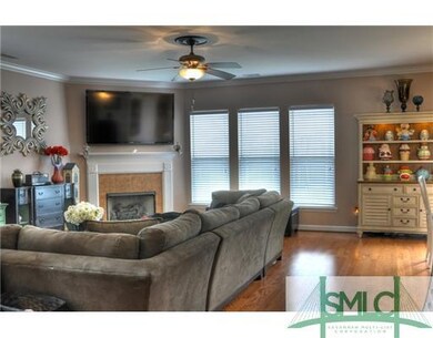 Living Room. Gas fireplace and hardwood floors in 