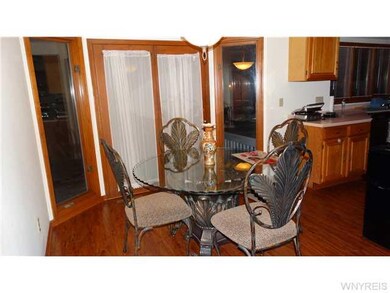 Breakfast Room Opens out to large deck And treed g
