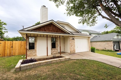 View of front of house with a garage, concrete dr