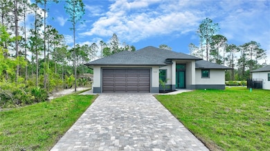 View of front of home featuring a garage and a fro