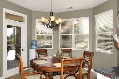 Ã¢â‚¬Â¢Granite counters in kitchen, white cabinets
