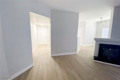 Unfurnished living room with light wood-type floor