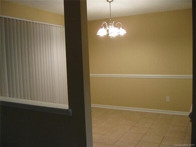 Spacious dining room with access to the patio and 