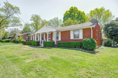 Large level lot surrounded by mature trees.