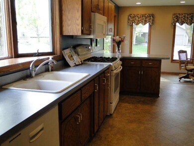 Large open kitchen, with breakfast bar, dinette ar