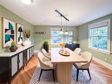 Virtually staged as a dining room as it should be.