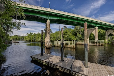 Dock featuring a water view