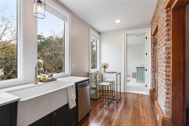 Another look at the kitchen and large windows.