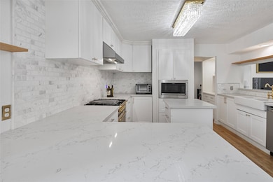 Kitchen- Quartz countertops & Marble backsplash