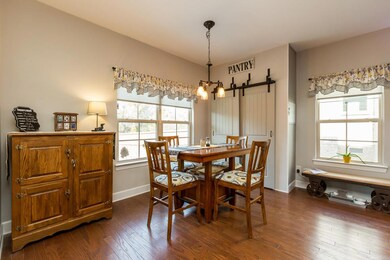 Check out this custom pantry that was added! Lots of useful shelving inside.