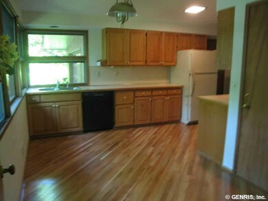 Kitchen. Beautiful hardwood floors, updated cabine