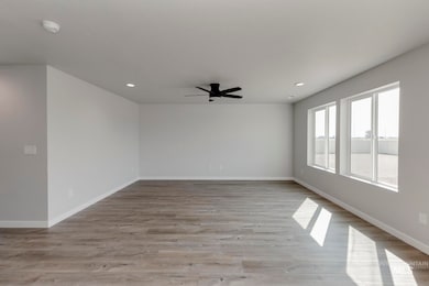 Unfurnished room featuring light wood-type flooring, recessed lighting, and ceiling fan