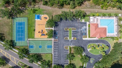 Community pool, tennis/pickleball court, basketball court, playground