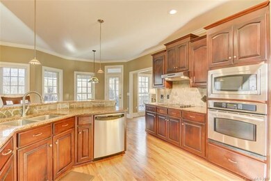 Great open floor plan to the keeping room and brea