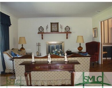 Living Room. Parquet wood floors in this large roo