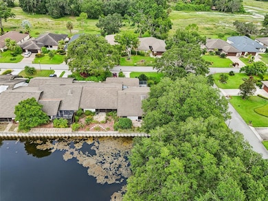 Your single story END-UNIT awaits with VAULTED WOOD SLAT CEILINGS, large windows, and an open and airy layout - plus a NEW WATER HEATER (2023), UPDATED A/C (2022), 2016 roof and a 1-car garage!