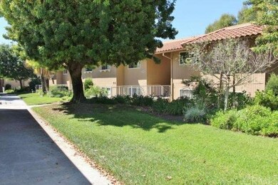 Lovely parklike location for this end unit Castill