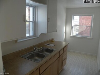 Light and bright kitchen. Also features an eat-in-