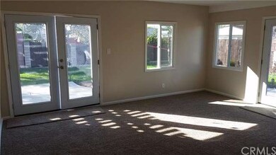 Bonus room looking out to the backyrd