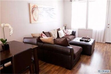 The beautiful living room features high quality la